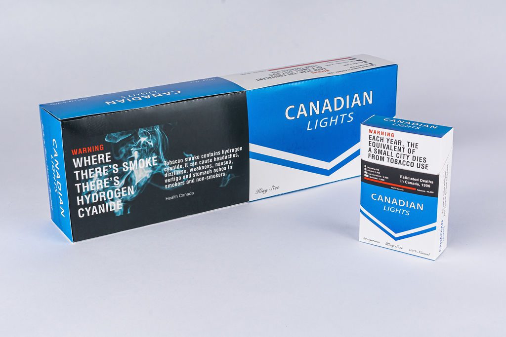 A Carton of Canadian Lights King Size Cigarettes Next to a Pack